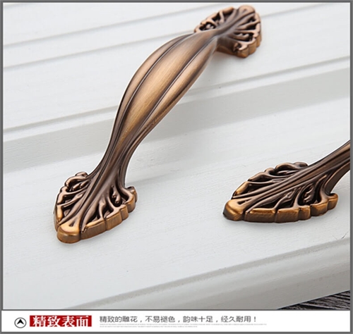 Tay nắm hình lá màu đồng